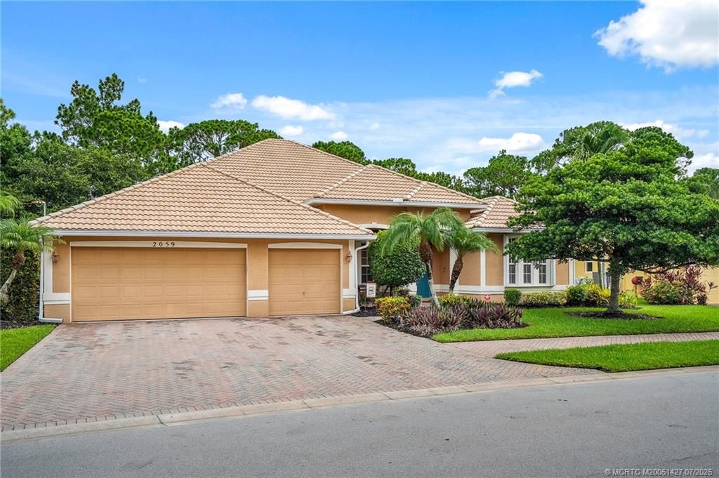 Photo of 2059 SW Panther Trace, Stuart, FL 34997 (MLS # M20051427)