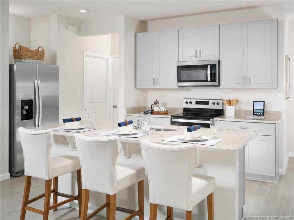 Photo of 5674 SE Edgewater Circle, Stuart, FL 34997 (MLS # M20039701)