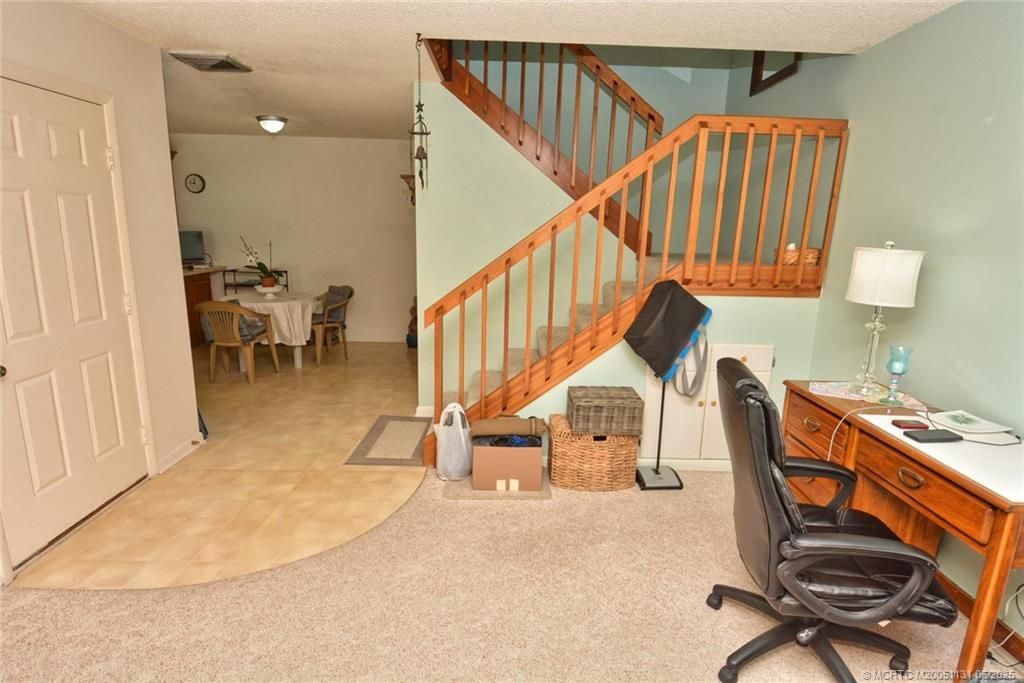 Photo of 5648 SE Windsong Lane #4-411, Stuart, FL 34997 (MLS # M20051131)