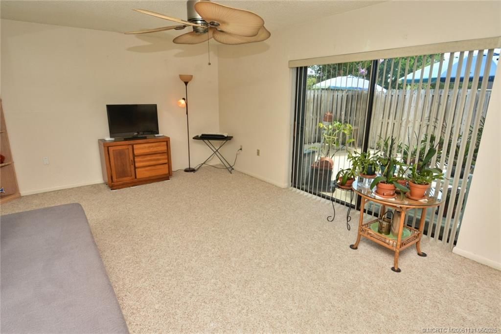 Photo of 5648 SE Windsong Lane #4-411, Stuart, FL 34997 (MLS # M20051131)