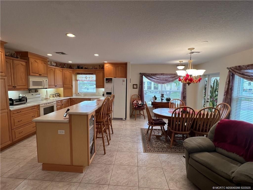 Photo of 993 Nettles Boulevard, Jensen Beach, FL 34957 (MLS # M20048398)