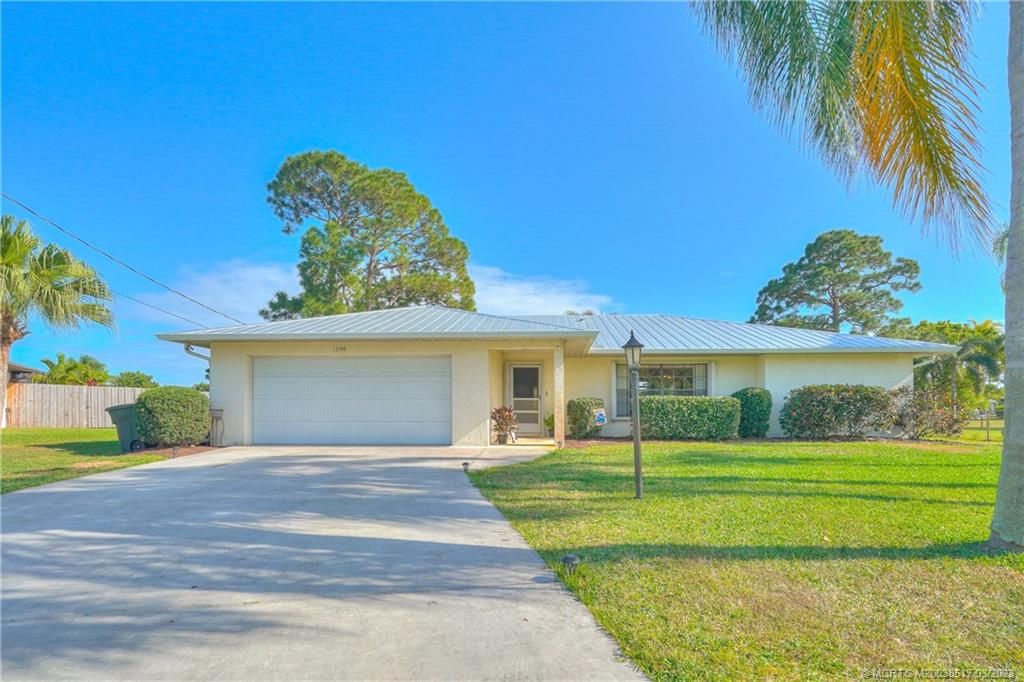 Photo of 1298 SE Mendavia Avenue, Port Saint Lucie, FL 34952 (MLS # M20038517)
