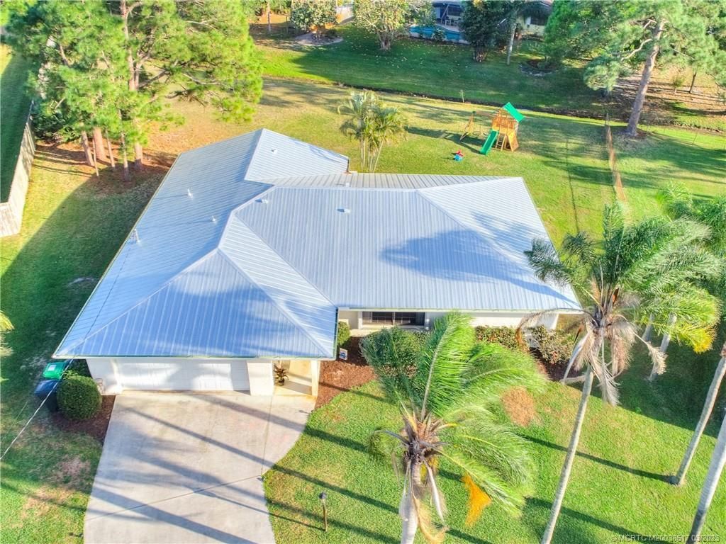 Photo of 1298 SE Mendavia Avenue, Port Saint Lucie, FL 34952 (MLS # M20038517)