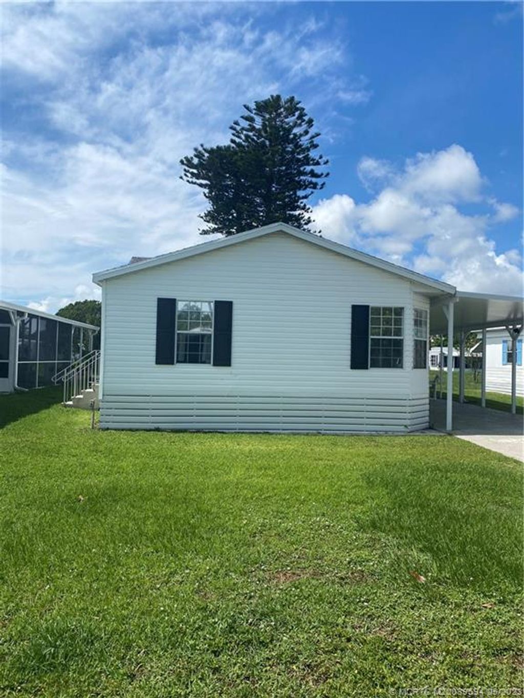 Photo of 71 El Camino Real Real, Port Saint Lucie, FL 34952 (MLS # M20039594)