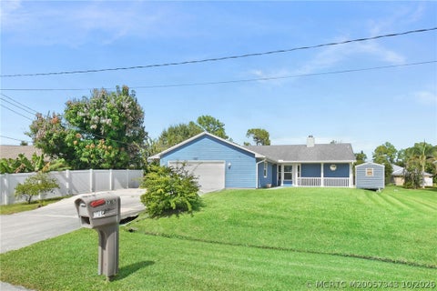 Photo of 2367 SW Madrid Road, Port Saint Lucie, FL 34953 (MLS # M20057343)