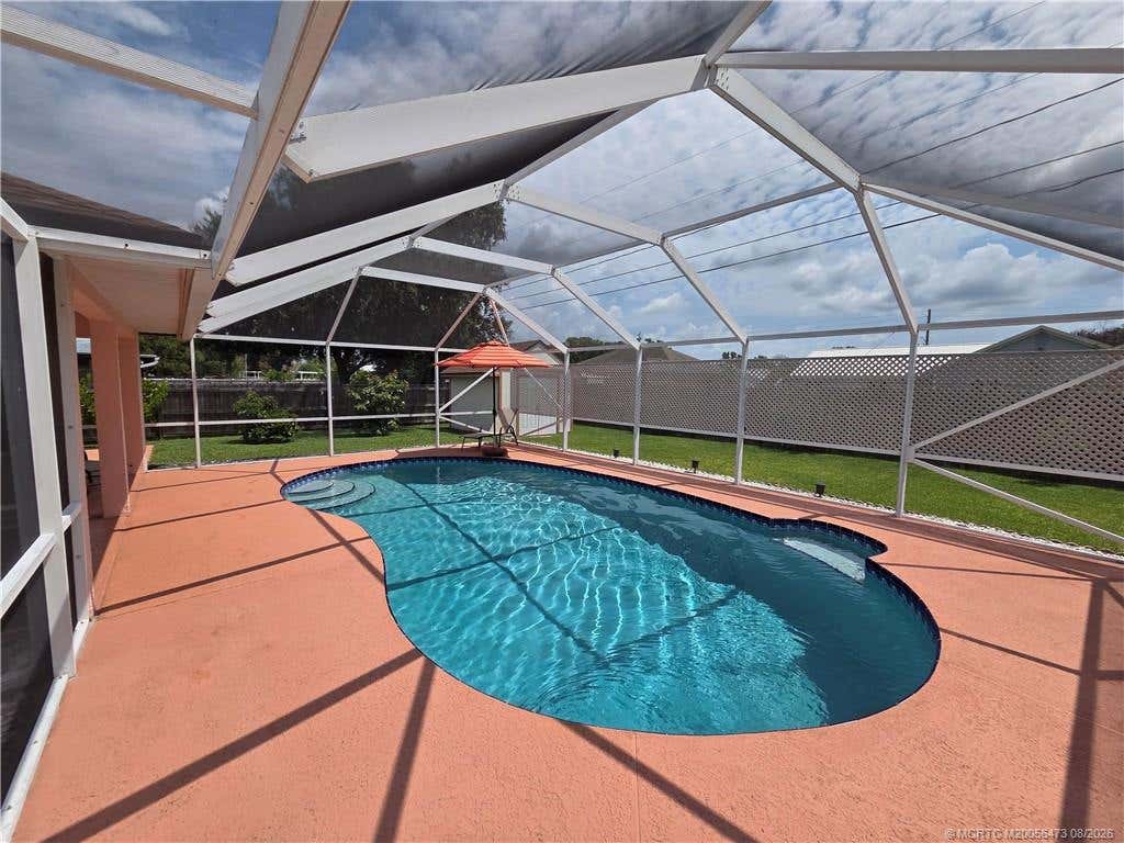 Photo of 2007 SE Heathwood Circle, Port Saint Lucie, FL 34952 (MLS # M20056473)