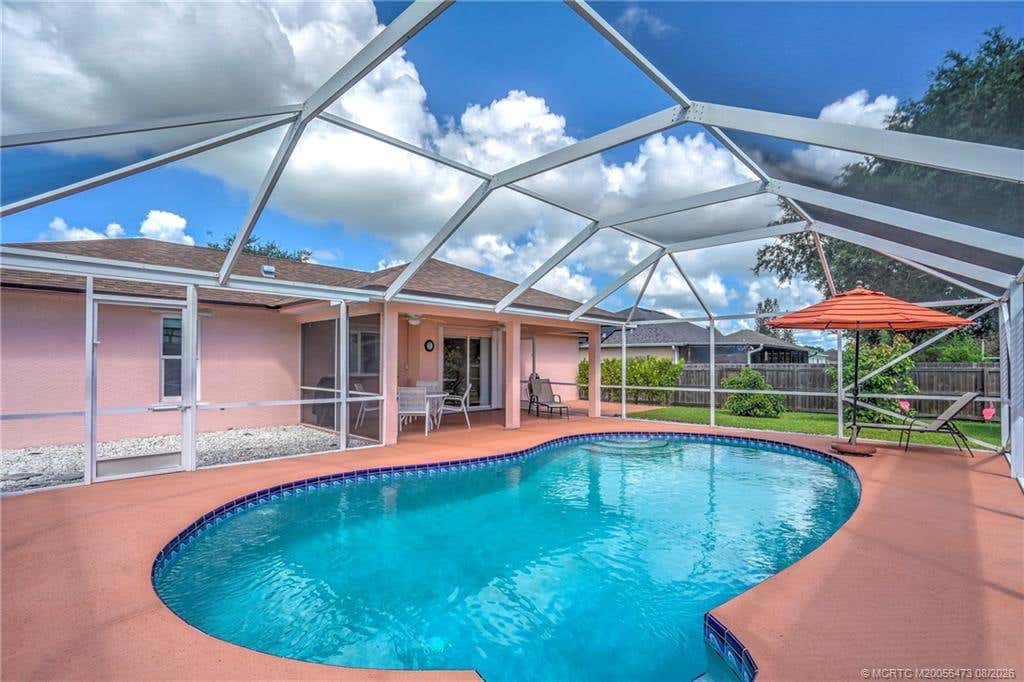 Photo of 2007 SE Heathwood Circle, Port Saint Lucie, FL 34952 (MLS # M20056473)