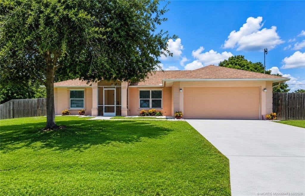 Photo of 2007 SE Heathwood Circle, Port Saint Lucie, FL 34952 (MLS # M20056473)