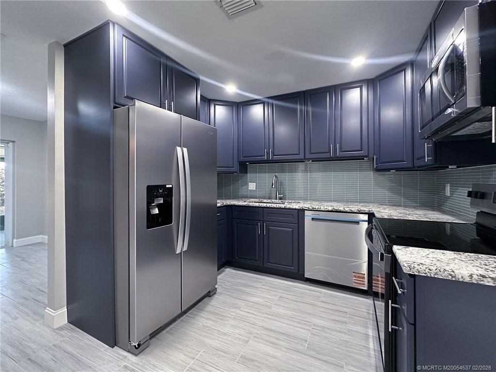 Photo of 315 SE Norfolk Boulevard, Stuart, FL 34997 (MLS # M20054537)