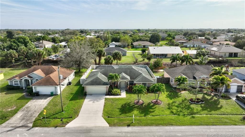 Photo of 918 SW Jeremko Avenue, Port Saint Lucie, FL 34953 (MLS # M20042307)