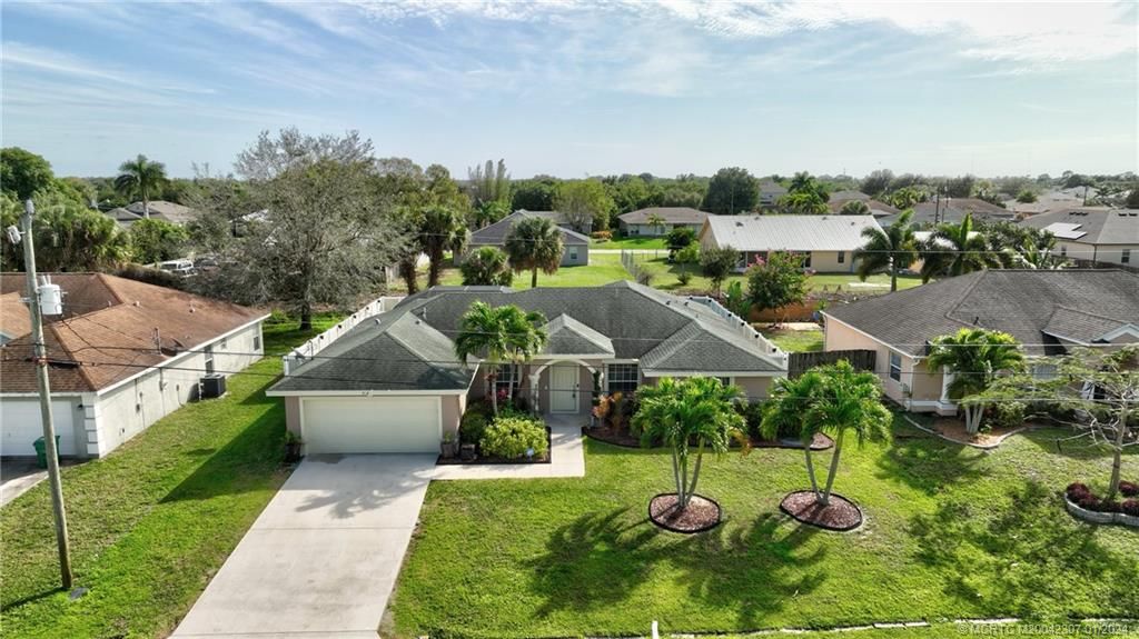 Photo of 918 SW Jeremko Avenue, Port Saint Lucie, FL 34953 (MLS # M20042307)