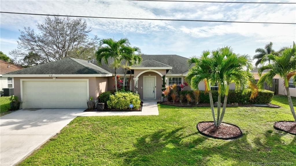 Photo of 918 SW Jeremko Avenue, Port Saint Lucie, FL 34953 (MLS # M20042307)