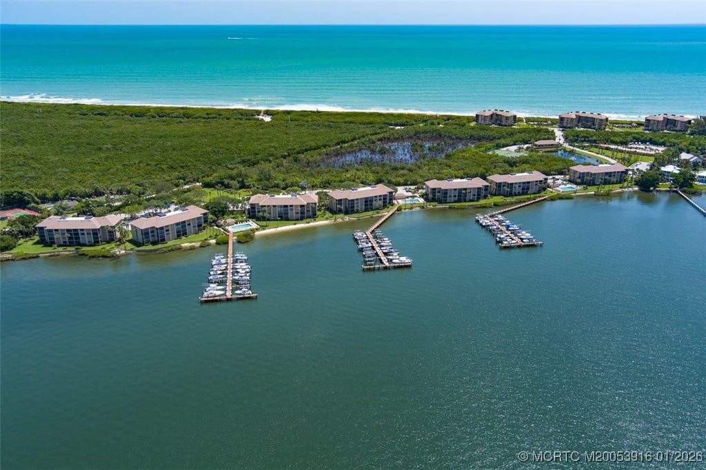 Photo of 4490 NE Sandpebble Trace #105, Stuart, FL 34996 (MLS # M20053916)