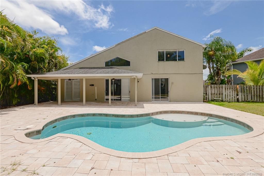 Photo of 2541 SW Estella Terrace, Palm City, FL 34990 (MLS # M20051317)