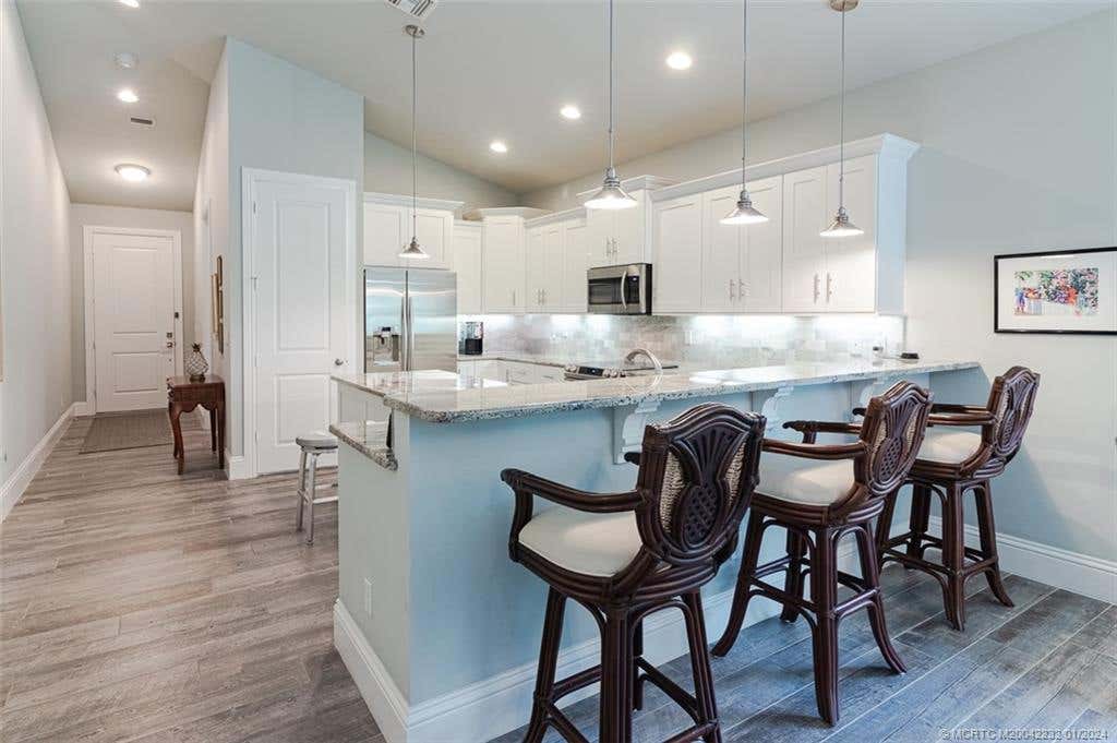 Photo of 522 SW Marion Court, Palm City, FL 34990 (MLS # M20042232)