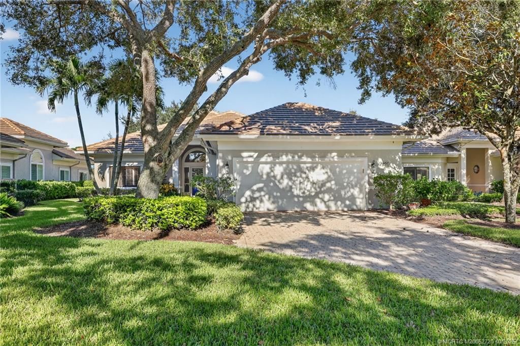 Photo of 6957 SE Pacific Drive, Stuart, FL 34997 (MLS # M20052720)