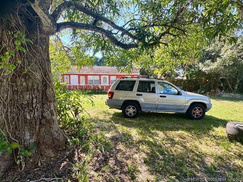 Photo of 888 SW 28th Street, Palm City, FL 34990 (MLS # M20053234)