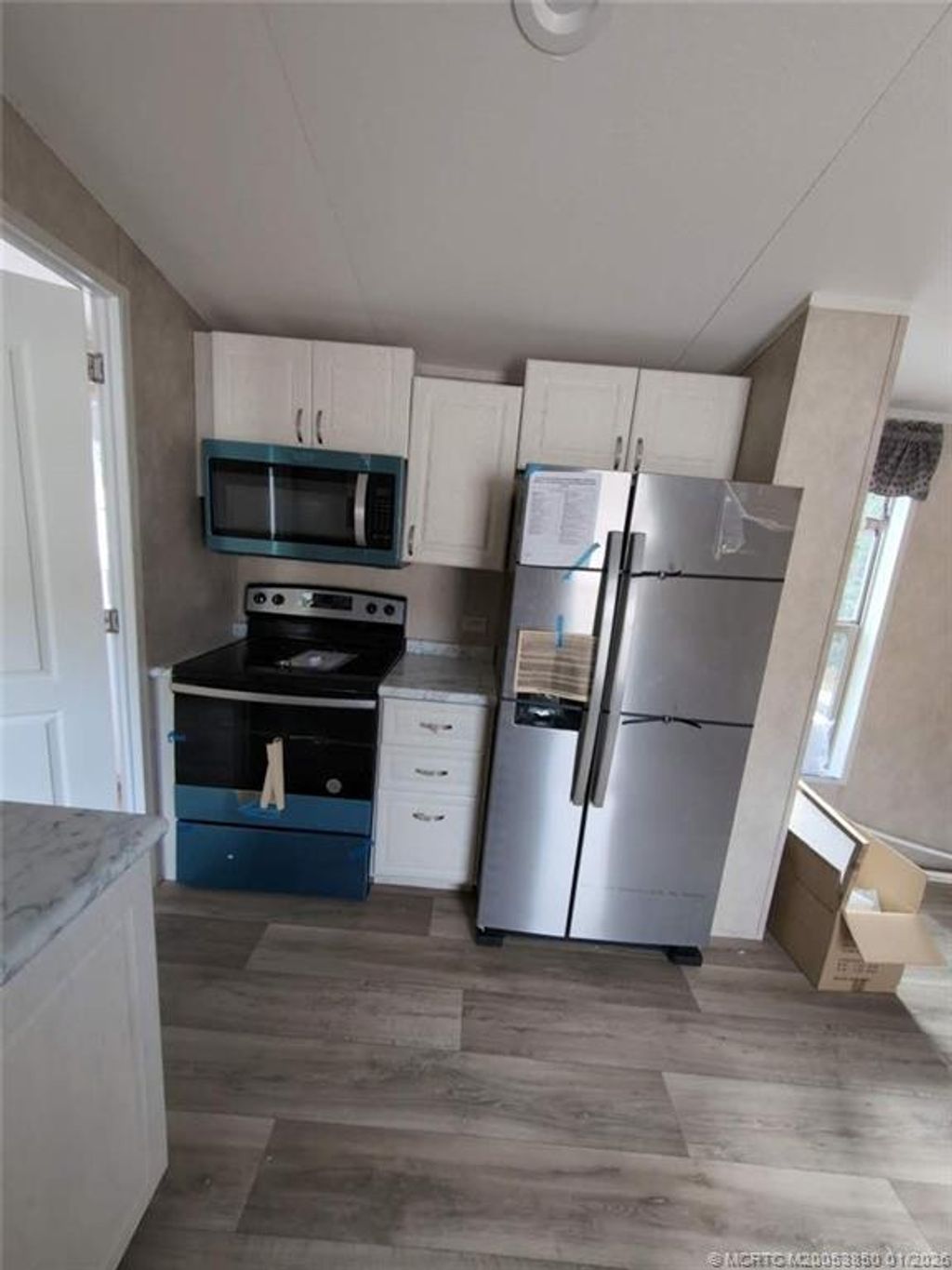 Photo of 2423 NE Palm Avenue #27A, Jensen Beach, FL 34957 (MLS # M20053850)