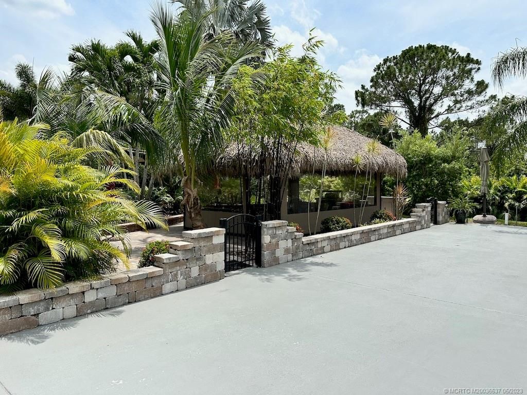 Photo of 60 NW Boundary Drive, Port Saint Lucie, FL 34986 (MLS # M20036537)