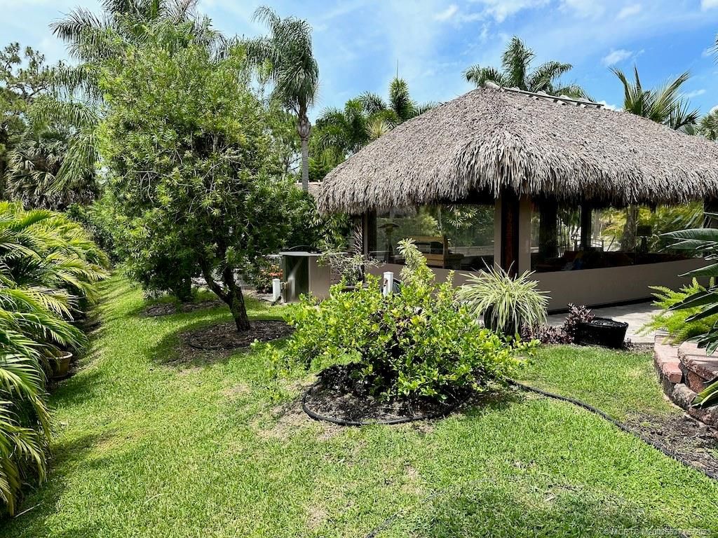 Photo of 60 NW Boundary Drive, Port Saint Lucie, FL 34986 (MLS # M20036537)