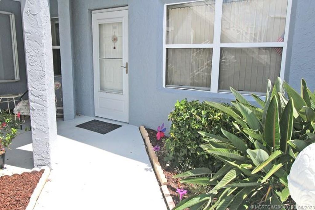 Photo of 3212 SE Aster Lane #Q110, Stuart, FL 34994 (MLS # M20040203)