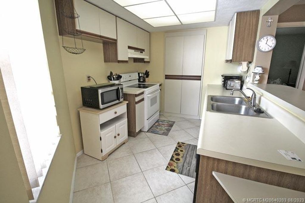 Photo of 3212 SE Aster Lane #Q110, Stuart, FL 34994 (MLS # M20040203)