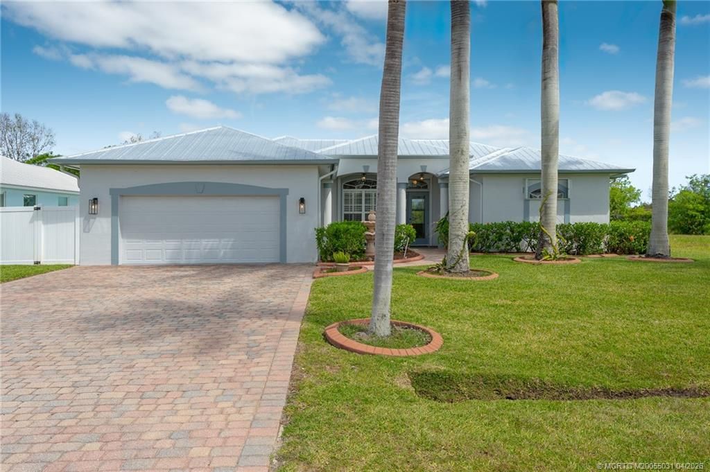 Photo of 5339 NW Milner Drive, Port Saint Lucie, FL 34983 (MLS # M20055031)