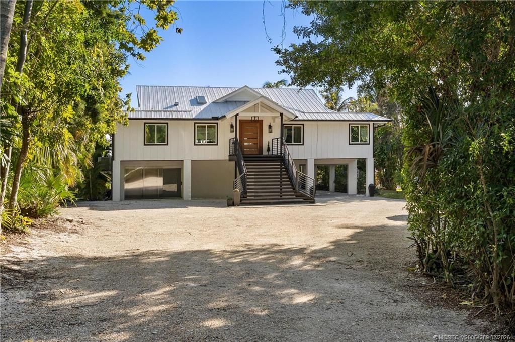 Photo of 90 NW Alice Street, Jensen Beach, FL 34957 (MLS # M20054289)