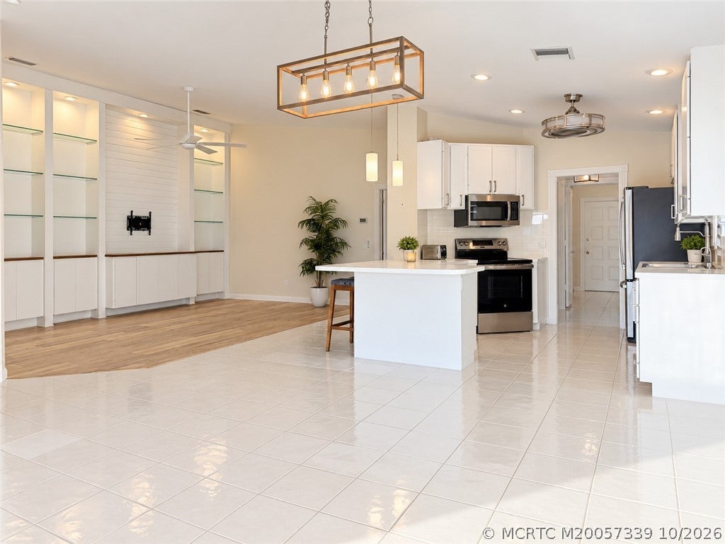 Photo of 1648 SW Waterfall Boulevard, Palm City, FL 34990 (MLS # M20057339)