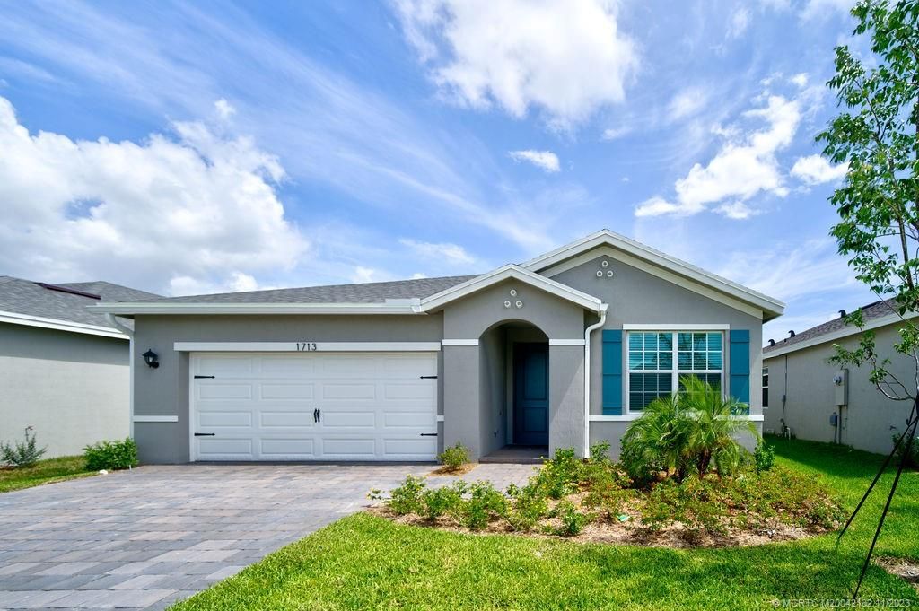 Photo of 1713 NE White Pine Terrace, Jensen Beach, FL 34957 (MLS # M20042132)