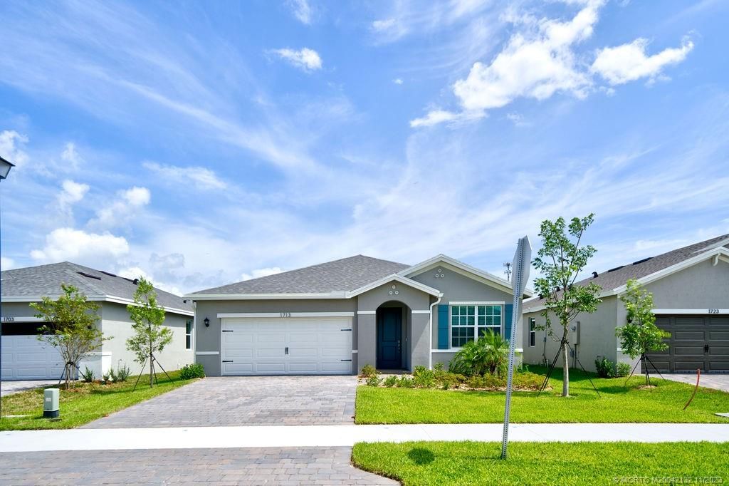 Photo of 1713 NE White Pine Terrace, Jensen Beach, FL 34957 (MLS # M20042132)