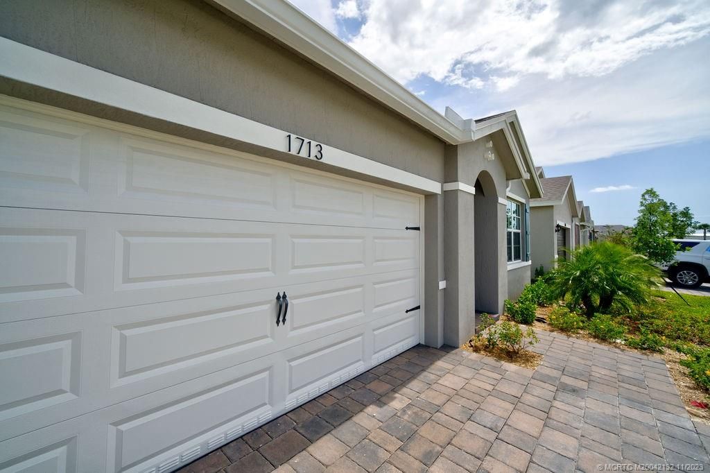 Photo of 1713 NE White Pine Terrace, Jensen Beach, FL 34957 (MLS # M20042132)
