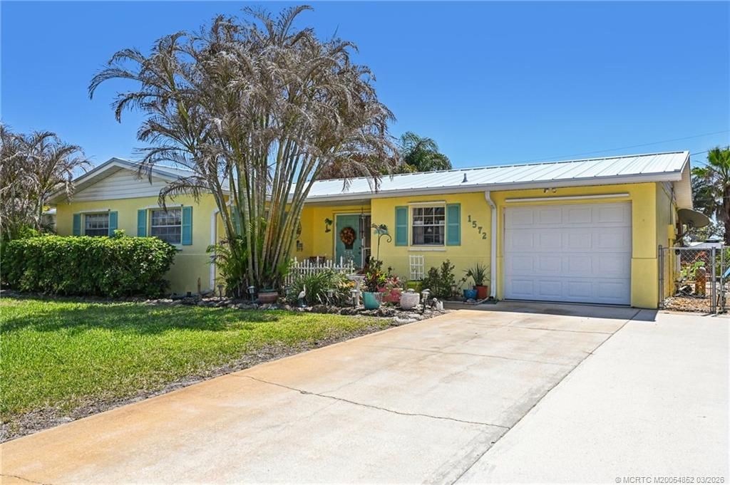 Photo of 1572 NE 22nd Street, Jensen Beach, FL 34957 (MLS # M20054852)