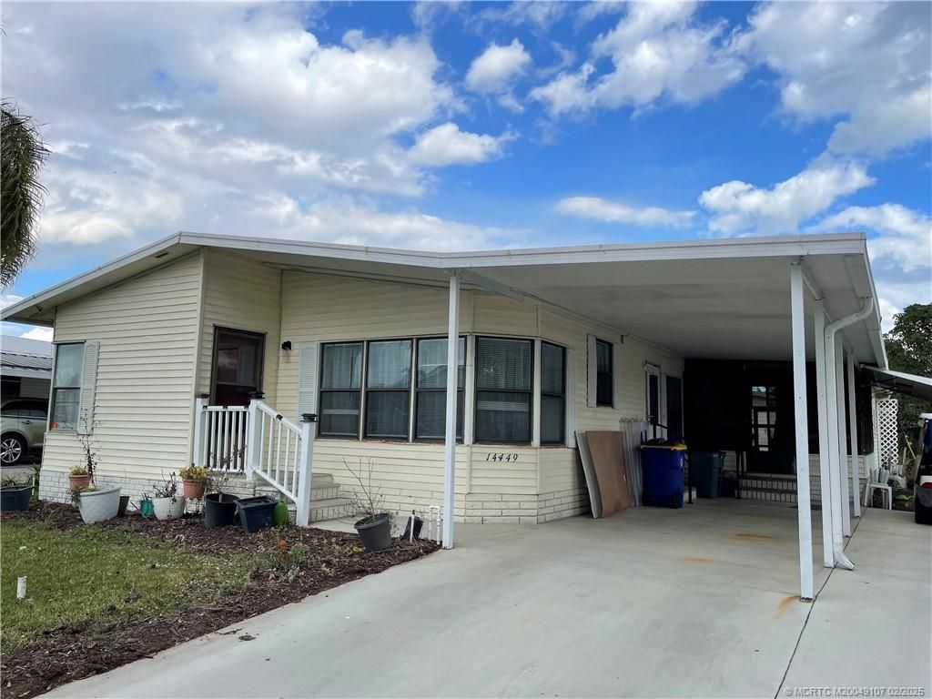 Photo of 14449 SW Sand Wedge Drive, Indiantown, FL 34956 (MLS # M20049107)