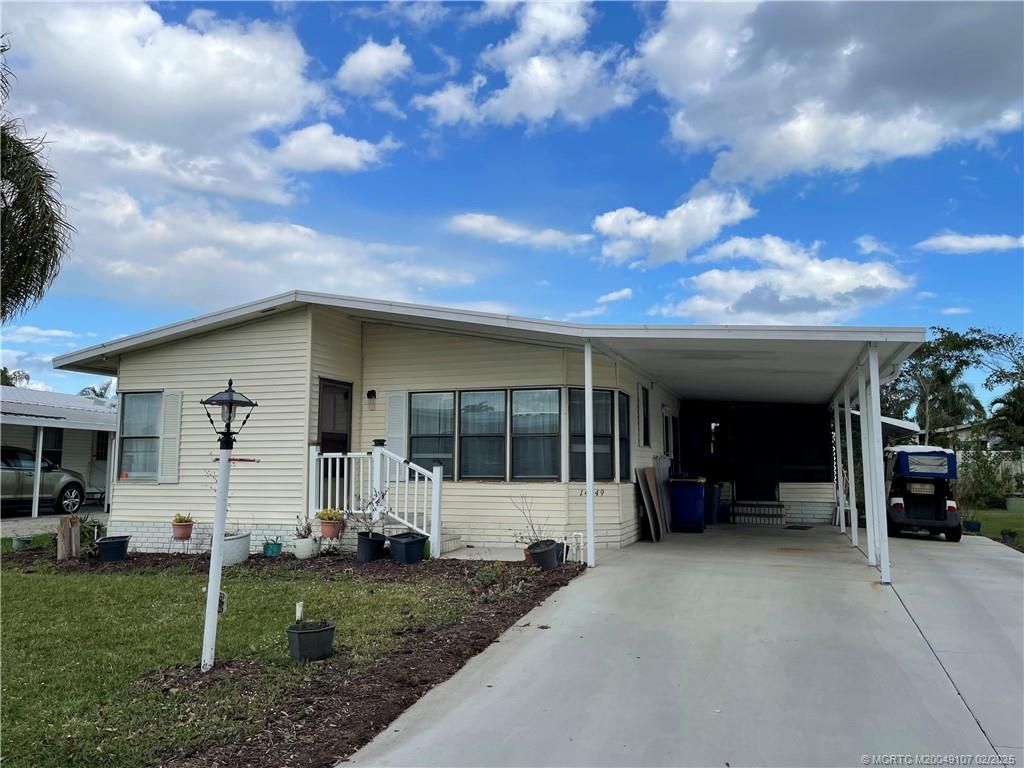 Photo of 14449 SW Sand Wedge Drive, Indiantown, FL 34956 (MLS # M20049107)