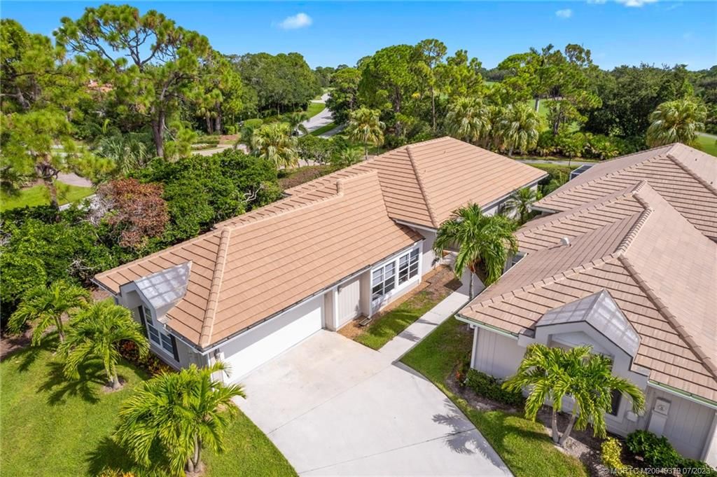 Photo of 2245 NW Seagrass Drive NW, Palm City, FL 34990 (MLS # M20040379)