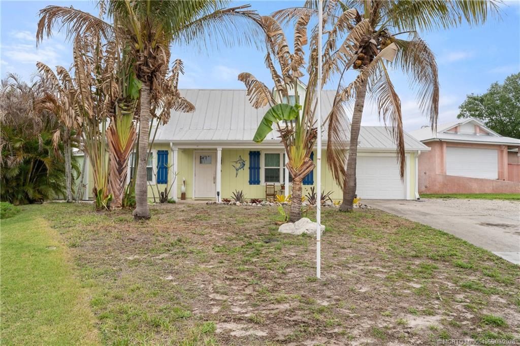 Photo of 1959 NE 23rd Terrace, Jensen Beach, FL 34957 (MLS # M20054955)