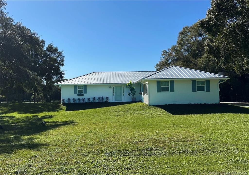 Photo of 5680 SW Grove Street, Palm City, FL 34990 (MLS # M20048165)