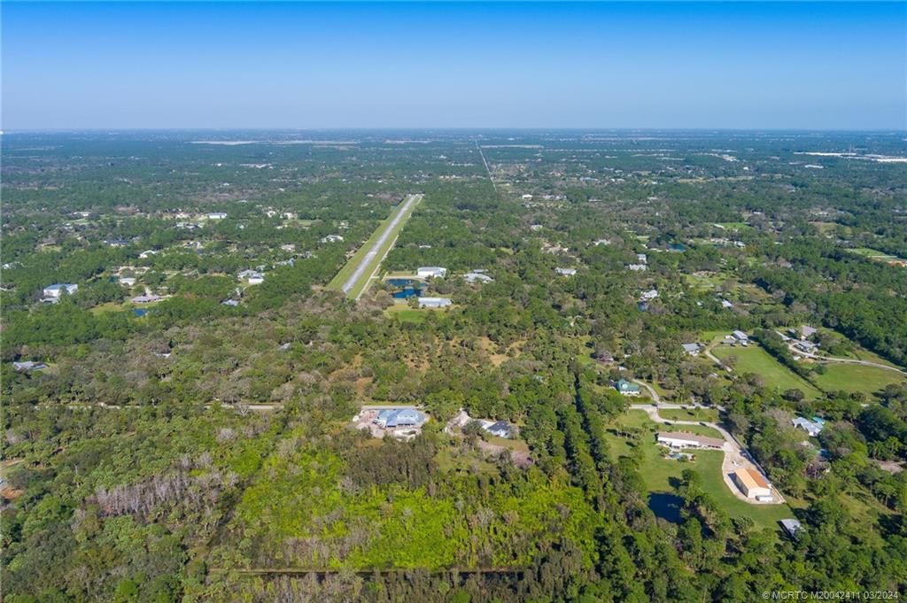 Photo of 6104 SW Woodham Street, Palm City, FL 34990 (MLS # M20042411)