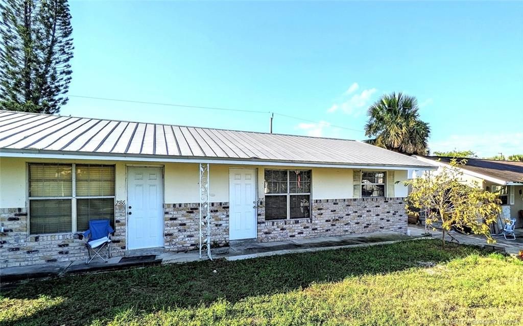 Photo of 2176 NE RUSTIC Place, Jensen Beach, FL 34957 (MLS # M20042992)
