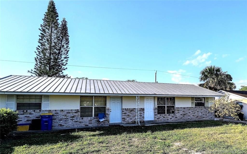 Photo of 2176 NE RUSTIC Place, Jensen Beach, FL 34957 (MLS # M20042992)