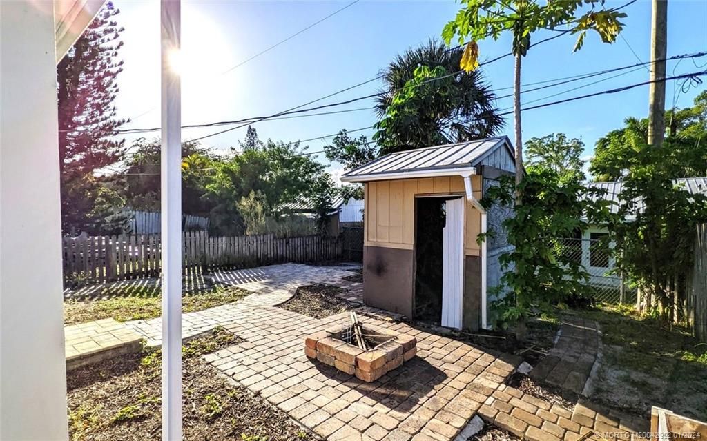 Photo of 2176 NE RUSTIC Place, Jensen Beach, FL 34957 (MLS # M20042992)