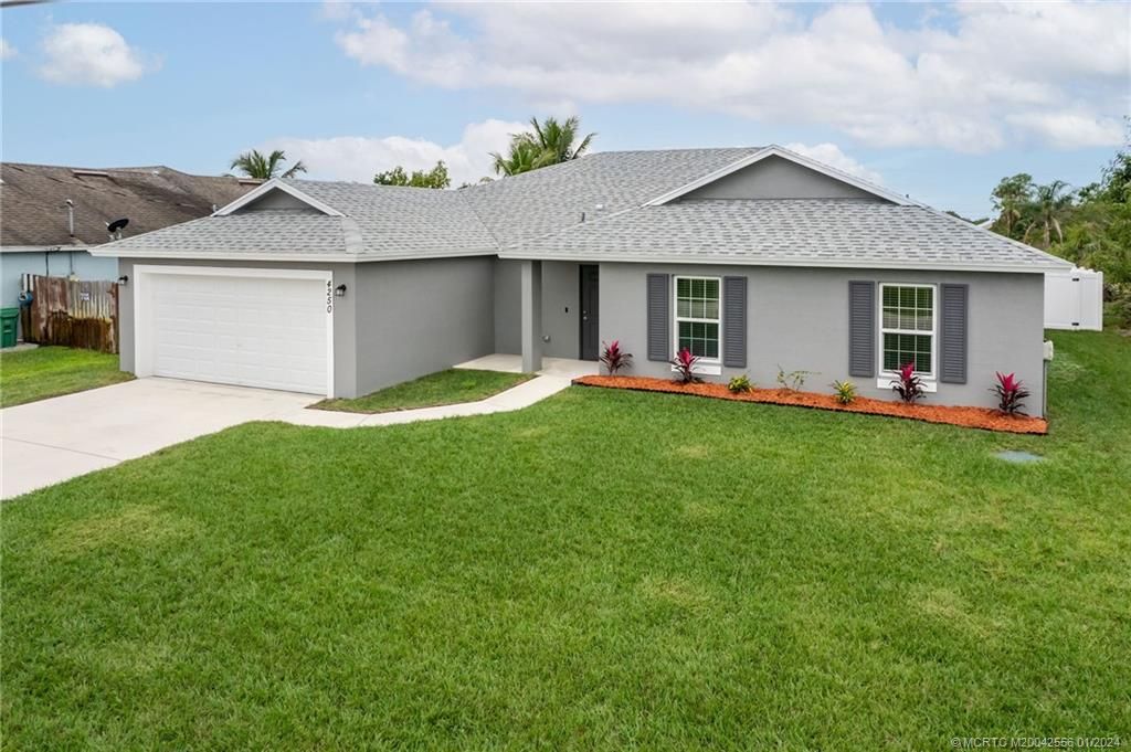 Photo of 4250 SW Jame Street, Port Saint Lucie, FL 34953 (MLS # M20042556)
