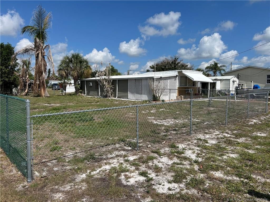 Photo of 1574 NE Oriole Avenue, Stuart, FL 34994 (MLS # M20055478)