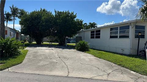 Photo of 2105 Nettles Boulevard, Jensen Beach, FL 34957 (MLS # M20052771)