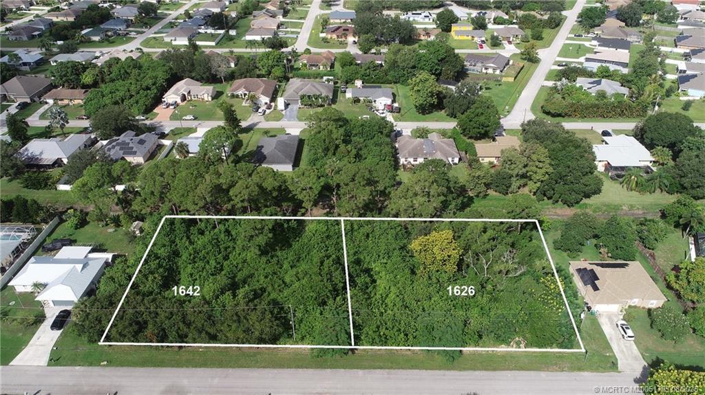 Photo of 1642 SW Brisbane Street, Port Saint Lucie, FL 34984 (MLS # M20051793)