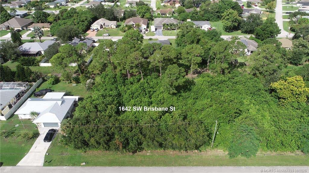 Photo of 1642 SW Brisbane Street, Port Saint Lucie, FL 34984 (MLS # M20051793)