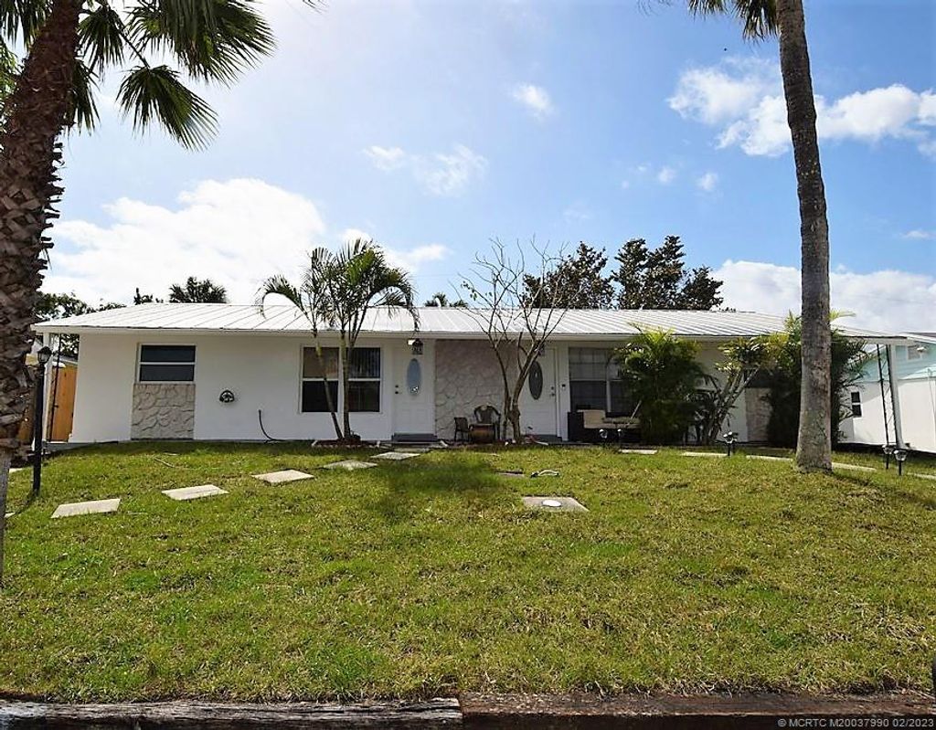 Photo of 2266 NE Rustic Place, Jensen Beach, FL 34957 (MLS # M20037990)