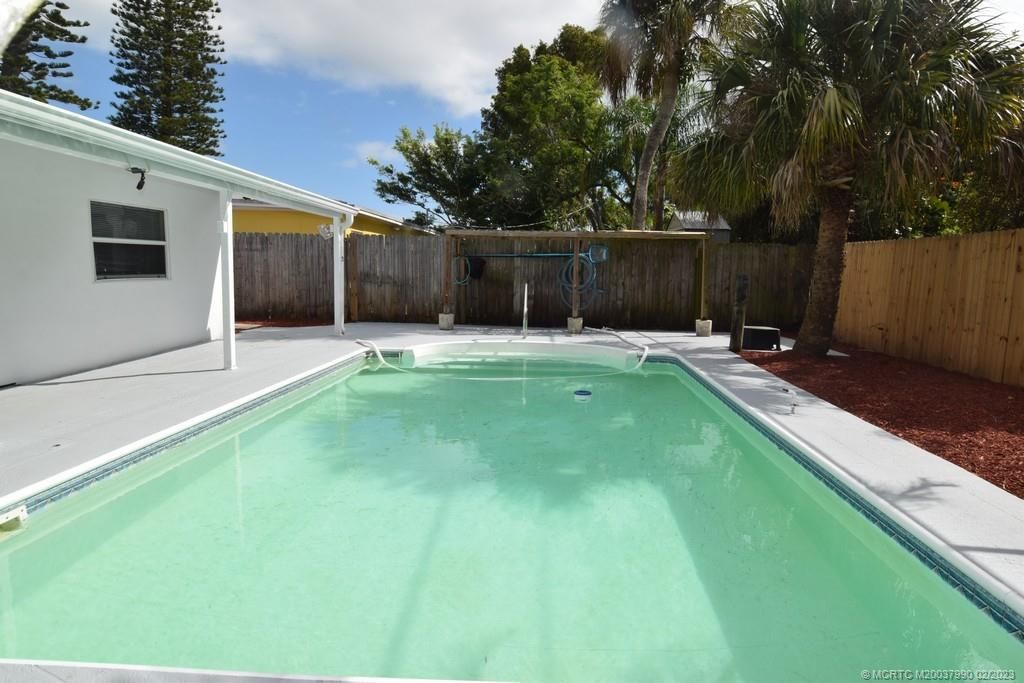 Photo of 2266 NE Rustic Place, Jensen Beach, FL 34957 (MLS # M20037990)