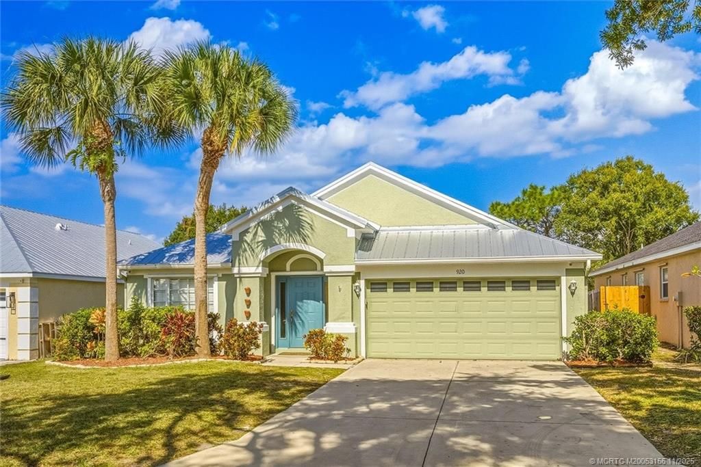 Photo of 920 NW Waterlily Place, Jensen Beach, FL 34957 (MLS # M20053156)